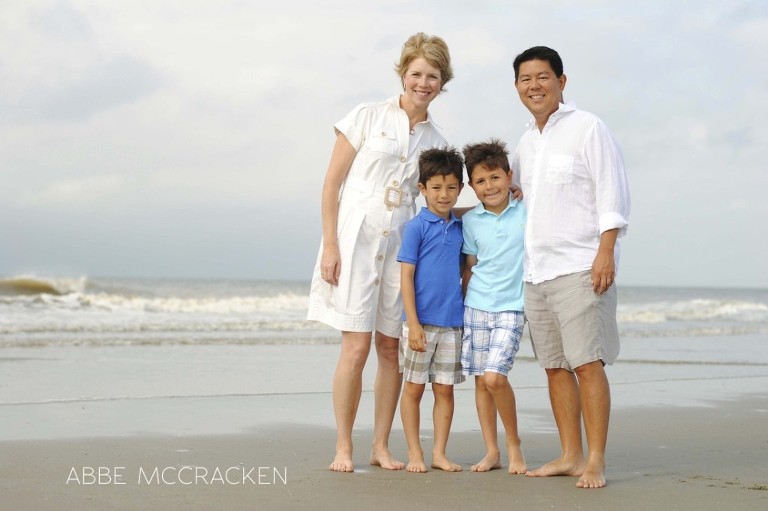 family on the beach in South Carolina, waves caps in background - Wild Dunes Resort