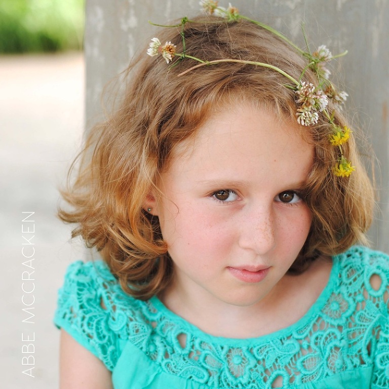 photographer's daughter - kid with flowers in her hair