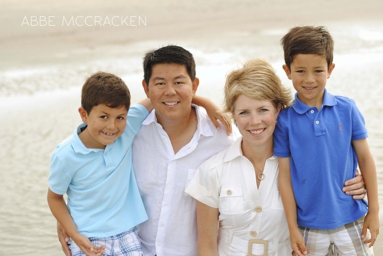 family portrait on the beach at Wild Dunes Resort