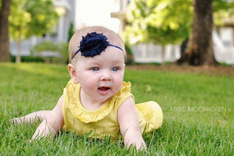 baby crawling in the grass