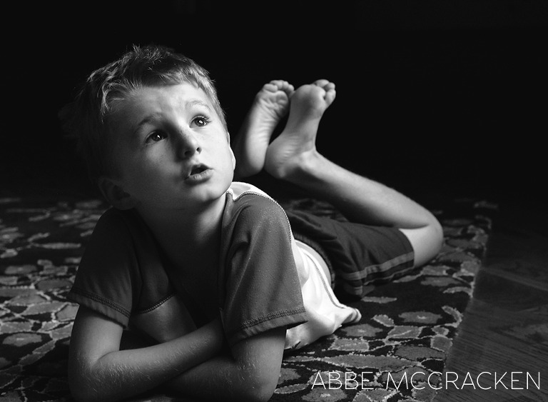 boy in dramatic light, black and white