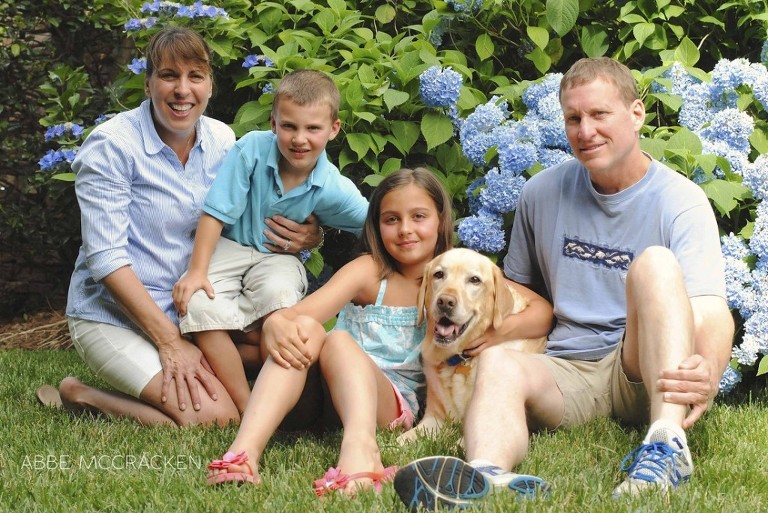 family with their dog