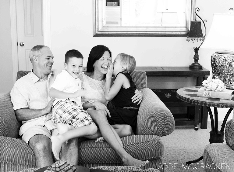 a family laughing together in their home
