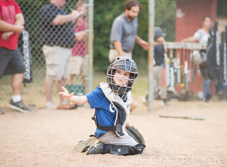 young boy on catcher - South Charlotte Recreation Association baseball