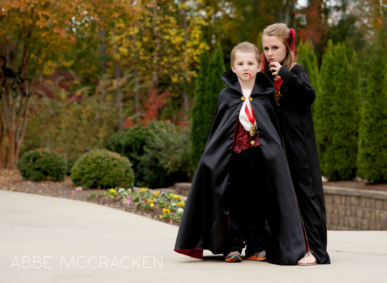 children dressed as vampires for Halloween