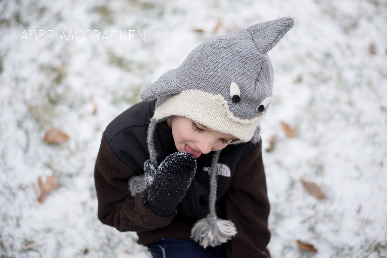 child eating snow