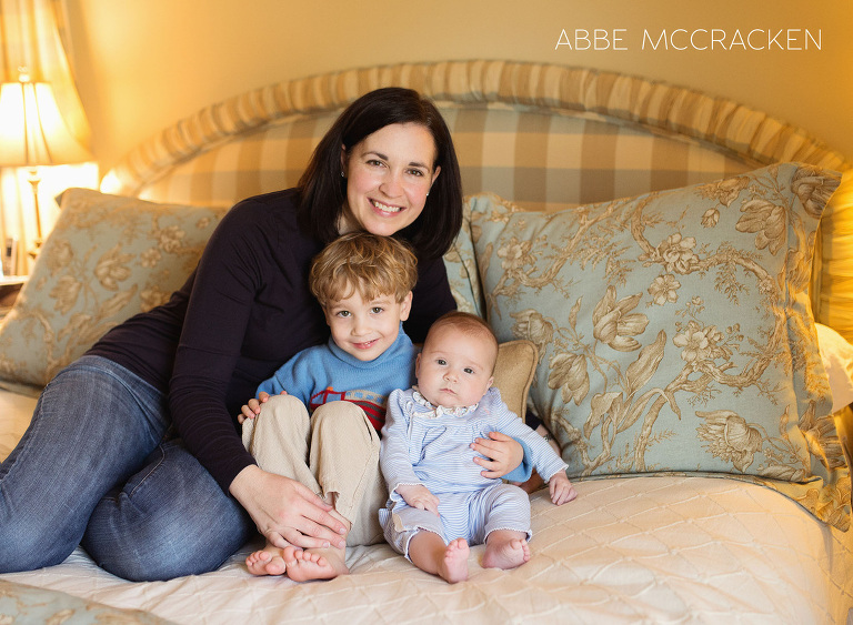 mommy and me photography session: a mother at home with two of her babies