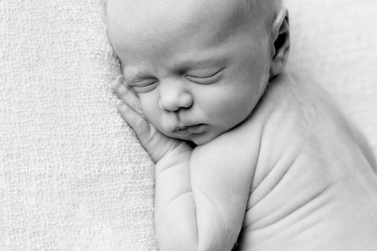 black and white portrait - close up image of newborn baby boy