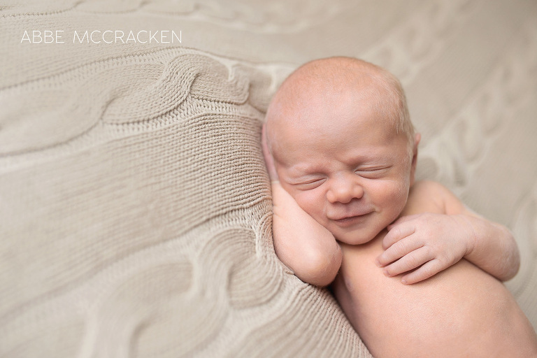 newborn portraits - Smiling baby boy