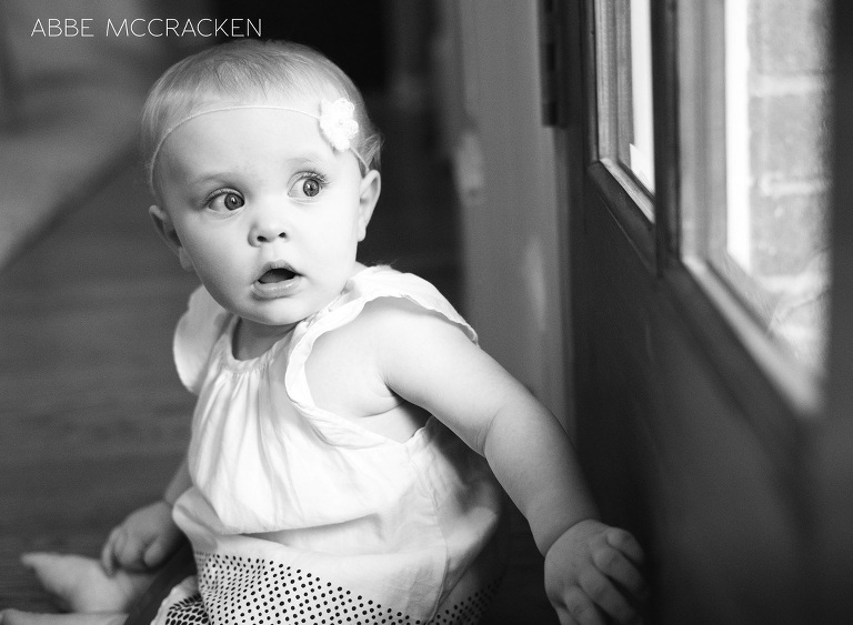 8 month old with the expression of wonder