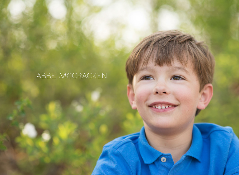 school boy reflecting and laughing