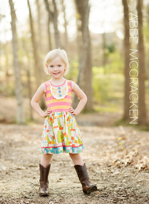 child in spring dress and cowgirl boots