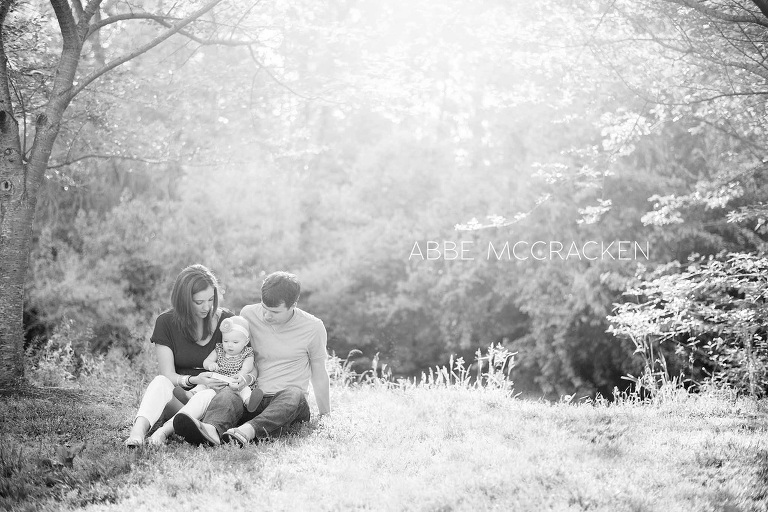 Reading to baby girl in Freedom Park