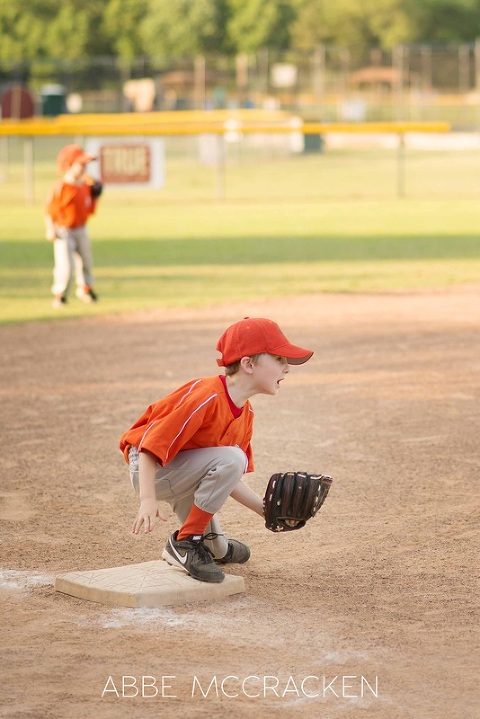 young boy playing baseball at South Charlotte Recreation Association