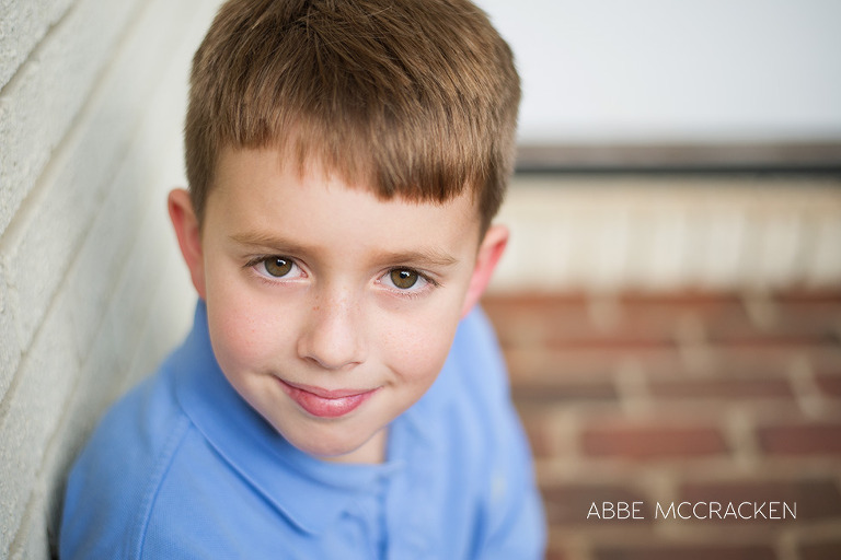 young boy connecting with photographer