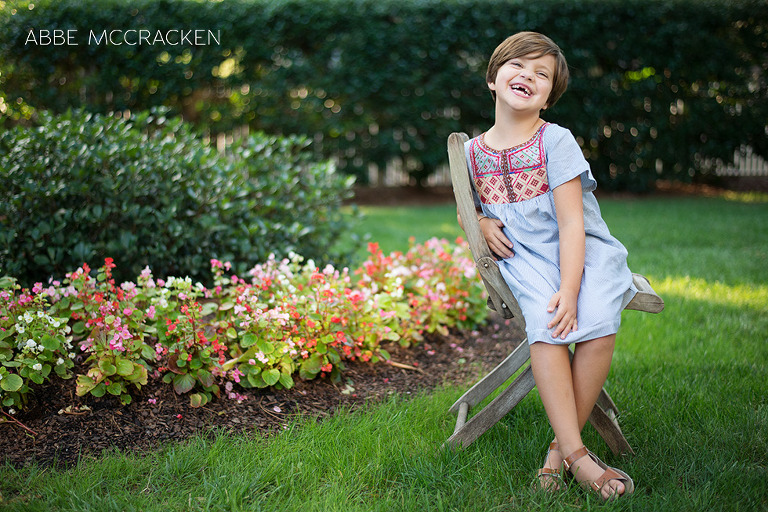 full body shot of young girl laughing