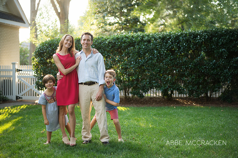 family of four having fun in their own backyard