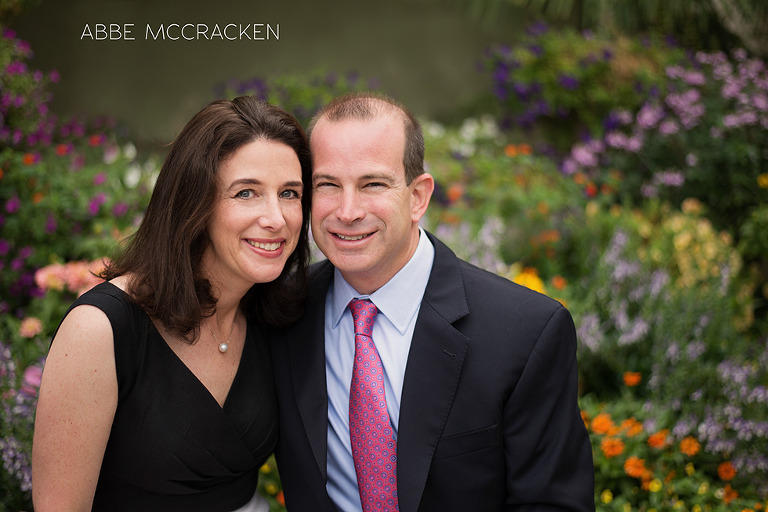 Parents at Bar Mitzvah with colorful garden in background