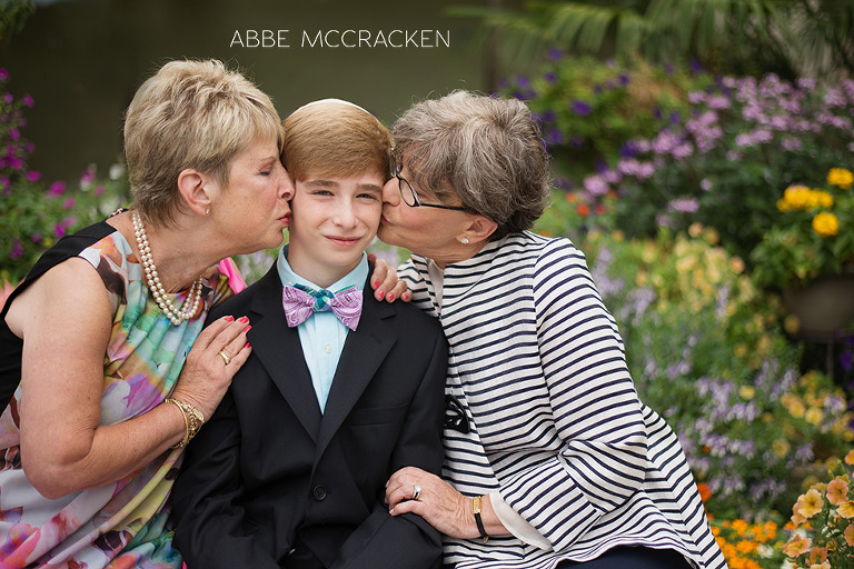 grandmothers kissing their grandson just before Bar Mitzvah ceremony - Temple Beth El