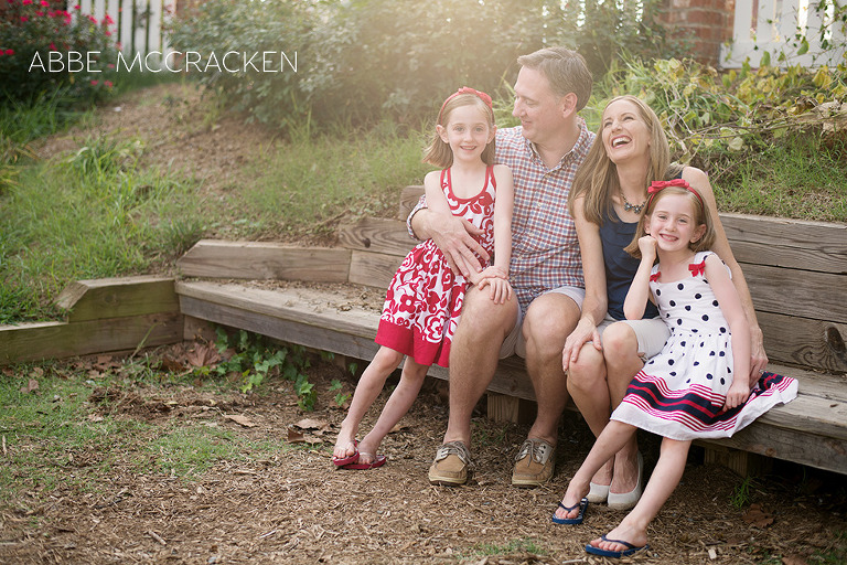 twins with parents in downtown Matthews
