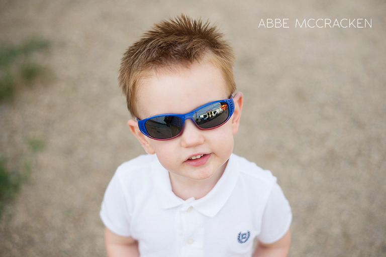child cruising the Matthews Farmers Market wearing his favorite sunglasses