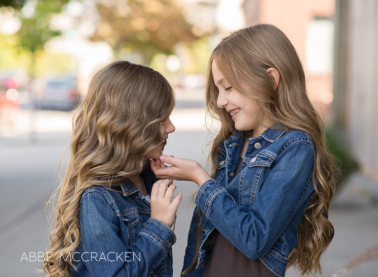 children giggling at each other