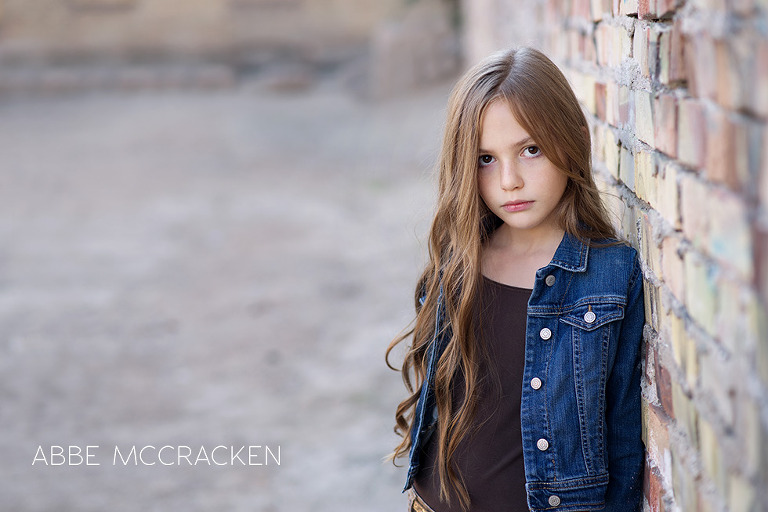 ClickAway kids - stunning girl, child posing in an abandoned city lot