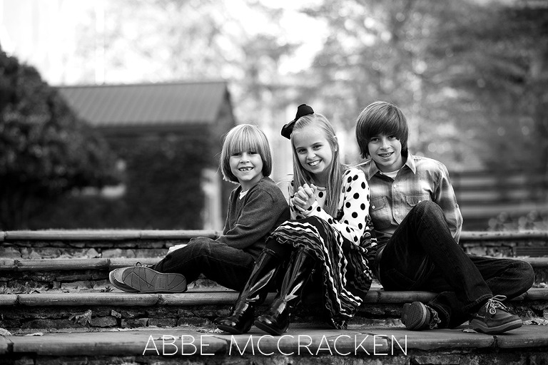 family portraits, siblings in uptown Charlotte, NC on The Green
