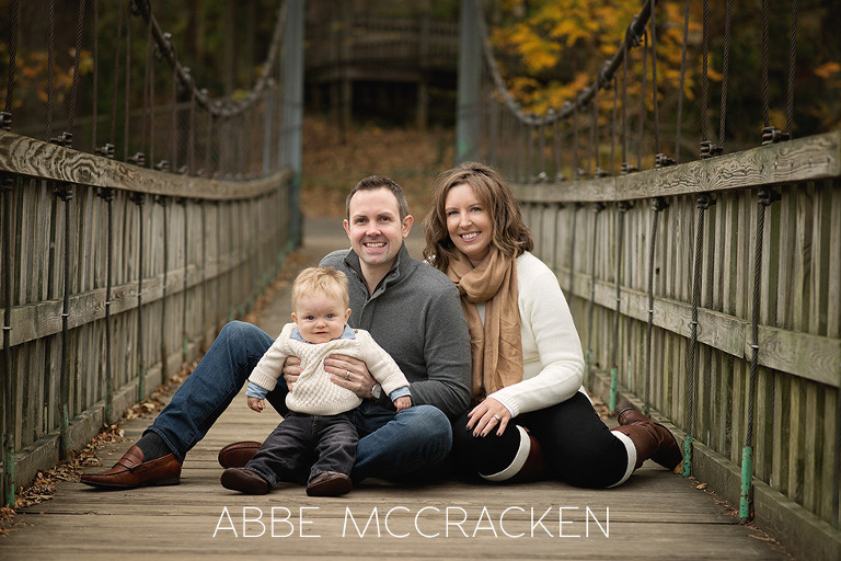 fall family portrait in Freedom Park - parents and baby boy