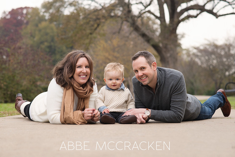 fall family portrait in Freedom Park - parents and baby boy