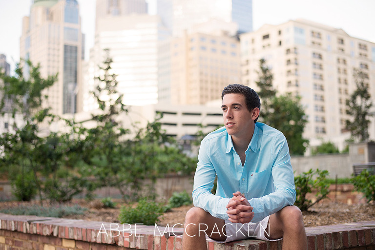Lifestyle portrait of a high senior in uptown Charlotte NC