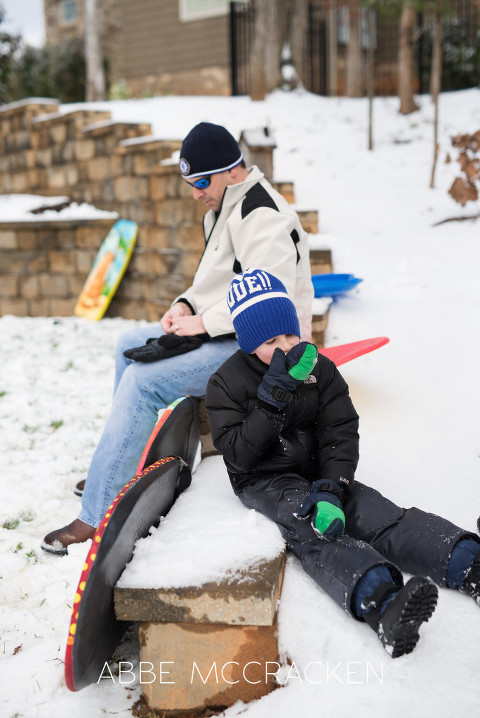 a child eating snow | Charlotte NC Childrens Photographer Abbe McCracken
