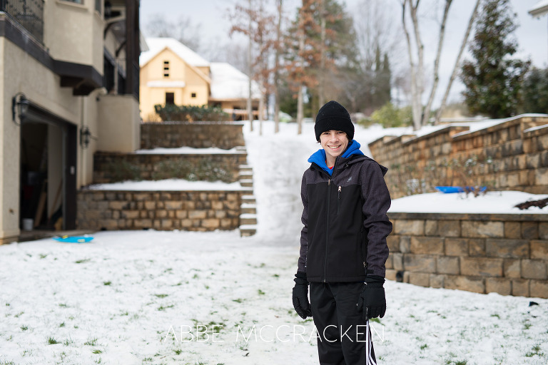 Teen boy enjoying a rare Charlotte NC snow day | Charlotte Childrens Photographer Abbe McCracken