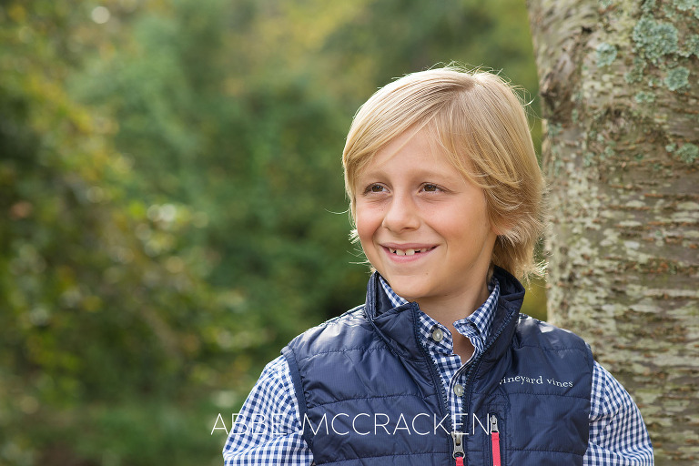 Portrait of a blond boy wearing Vineyard Vines vest