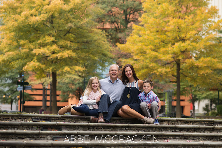 Family portrait taken during the fall on The Green in Uptown Charlotte