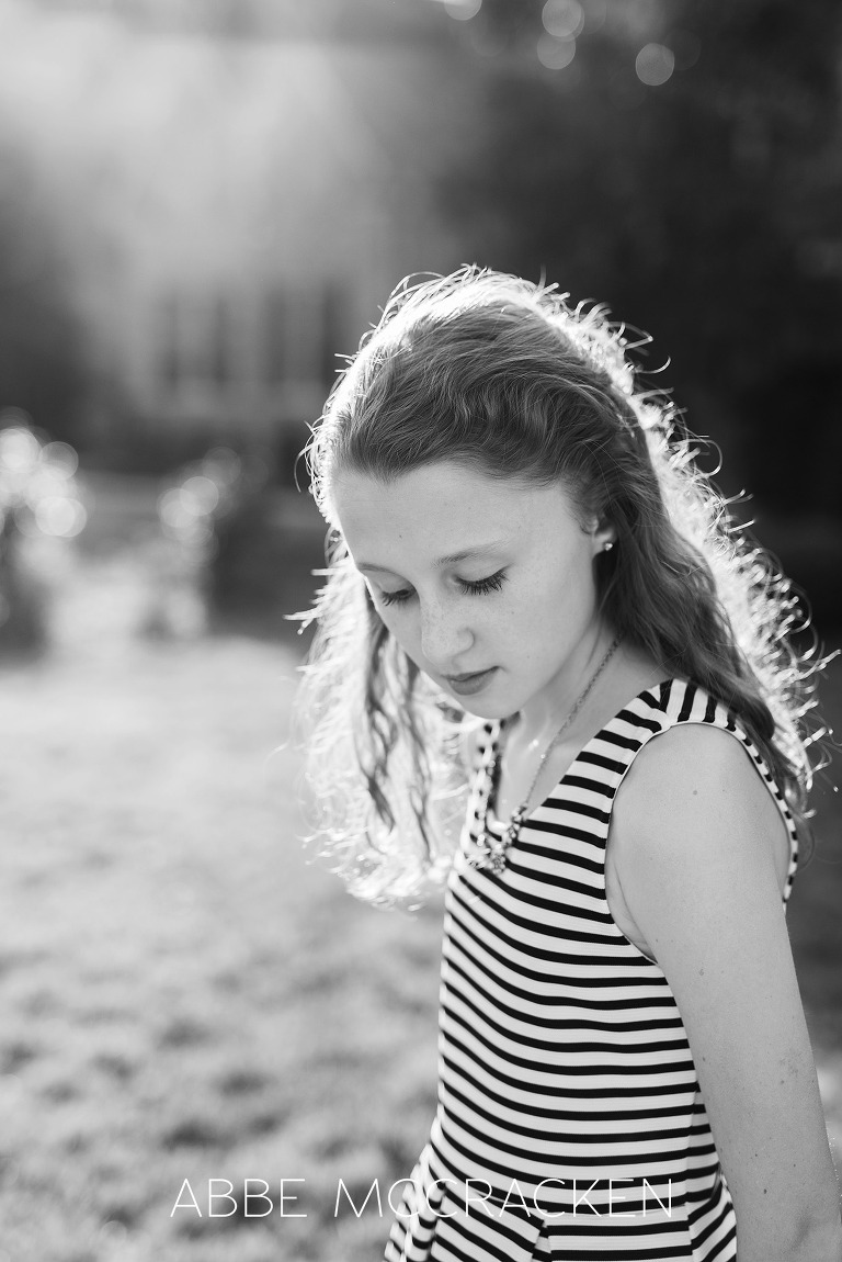 Black and white profile portrait of a young tween girl ready for her Charlotte Junior Cotillion dance