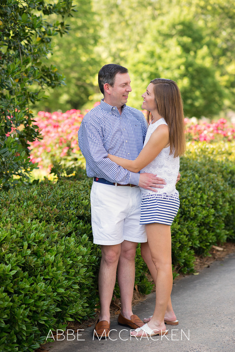 Photo of a couple taken during a spring family session at Carmel Country Club, Charlotte NC