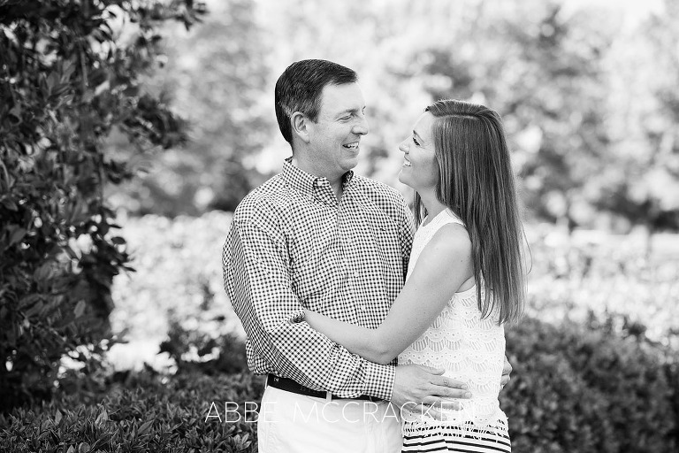 Black and white photo of a couple taken during a spring family session at Carmel Country Club, Charlotte NC