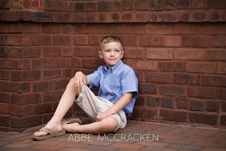 Portrait of a young boy near The Green in Uptown Charlotte