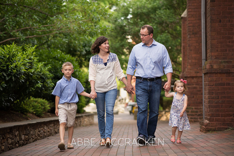 candid family portrait taken during the spring in Uptown Charlotte