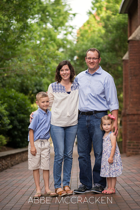 Casually posed family portrait taken during the spring in Uptown Charlotte