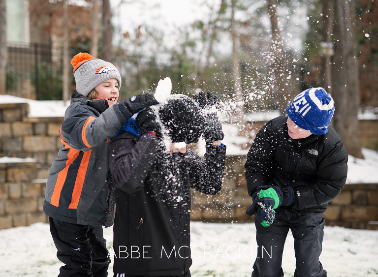 image of a snowball fight, surprise attack