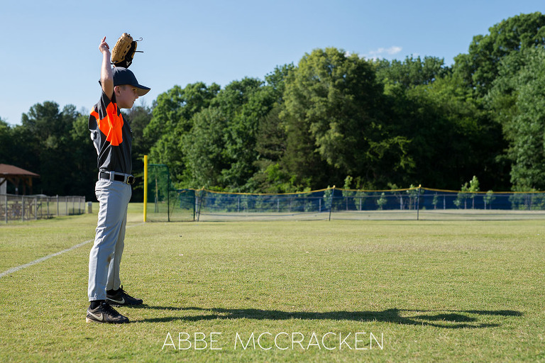 Youth Baseball Photography of a young boy in South Charlotte Recreation Association machine pitch league warming up