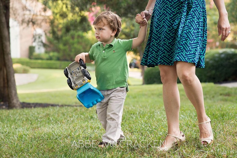 Summer family photo session - Mom and youngest son walking across their front yard