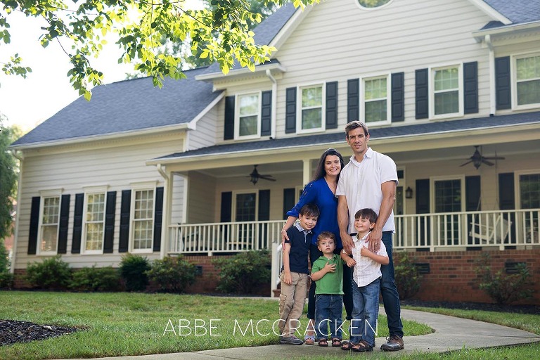 Family portrait in front of their Charlotte, NC home