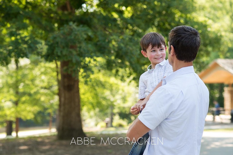 Lifestyle image of a father and son at Squirrel Lake Park in Matthews, NC - July 2016