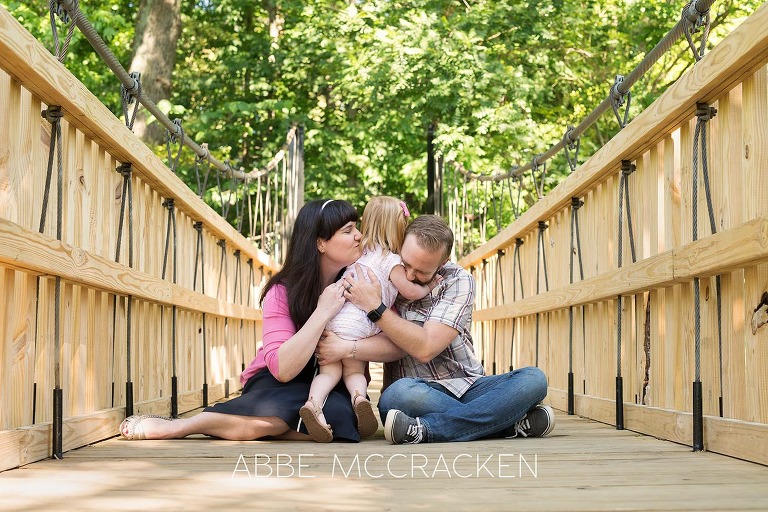 natural, relaxed, candid family pictures in Charlotte's Freedom Park with a two year old