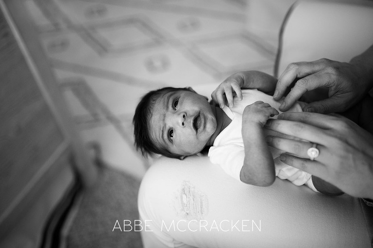 Black and white image of a newborn baby boy at home in Pineville, NC