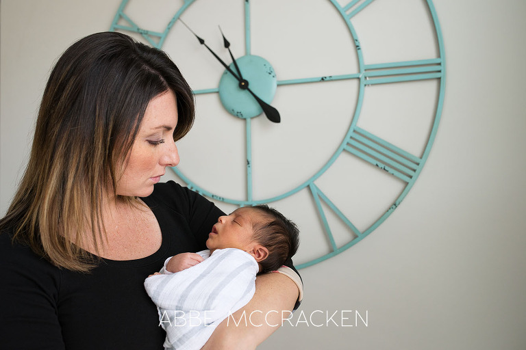 Portrait of a mother and newborn son