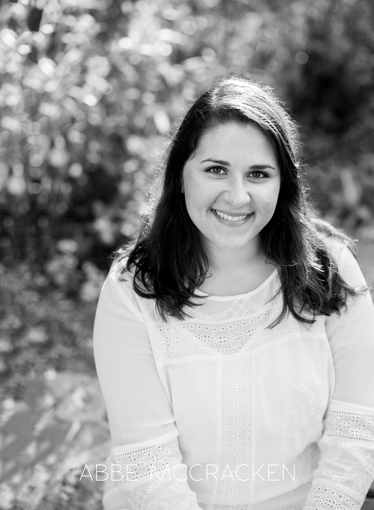 Black and white portrait of college student with gorgeous backlighting
